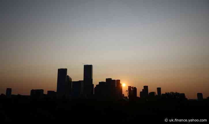 UK watchdog tells bankers to be strict about office working