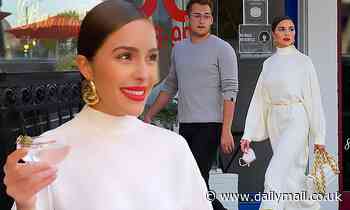 Olivia Culpo wears elegant cream dress at LA cafe with friends