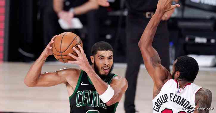 Celtics control second half, beat Heat 121-108 to stay afloat