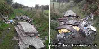 A demolished garage is found flytipped in Westhoughton countryside