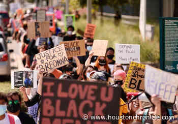 Protestors march in downtown Houston to demand justice for Breonna Taylor - Houston Chronicle
