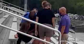 Woman tasered after refusing to wear face mask at Ohio school football game