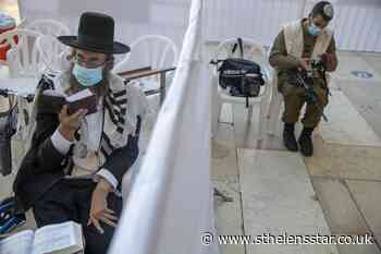 Israelis mark Yom Kippur under 'painful' virus lockdown - St Helens Star