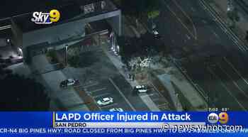 Officer pistol-whipped with his own gun inside a Los Angeles police station, cops say
