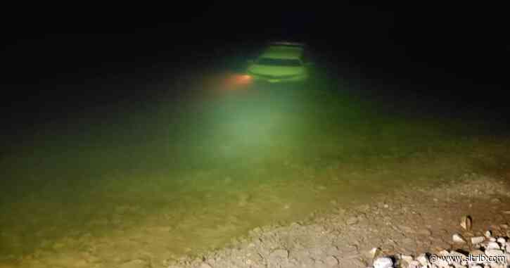 Police: Car submerged in Utah lake as owner takes pictures