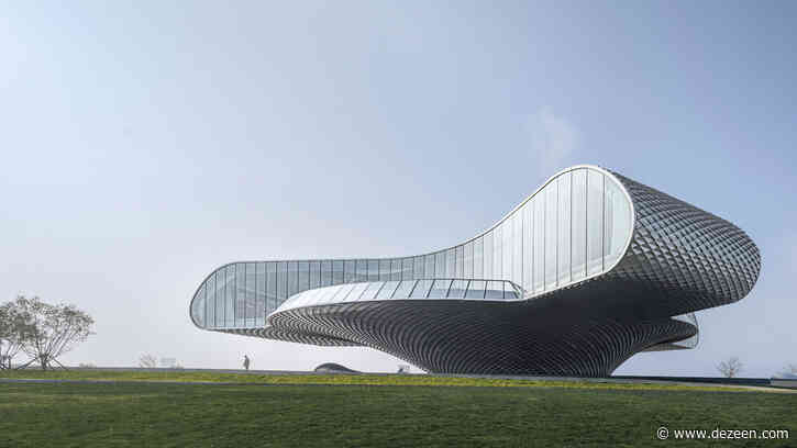 The Wave art gallery in China is wrapped by aluminium scales