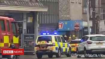 Man who poured petrol inside Blackpool bank surrenders
