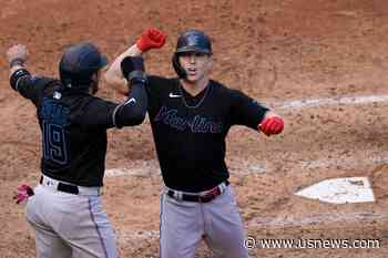 Dickerson Homers as Marlins Beat Cubs 5-1 in Playoff Opener
