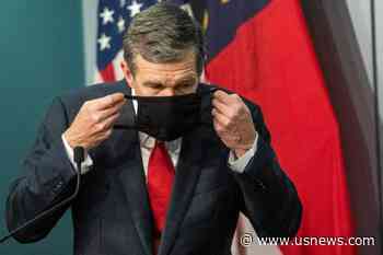 The Latest: North Dakota Targeting Coronavirus Hotspots