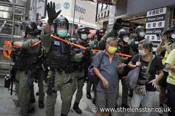 Hong Kong police arrest 60 for protesting on Chinese holiday - St Helens Star