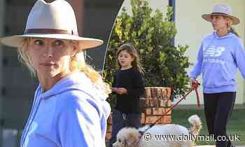 Chris Hemsworth's wife Elsa Pataky keeps a low profile while walking new puppy - Daily Mail