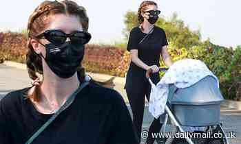 Katherine Schwarzenegger embraces mom life as she takes baby girl Lyla for a stroll