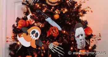Mum shows off her 'Halloween' decorations as she sneaks Christmas tree up early