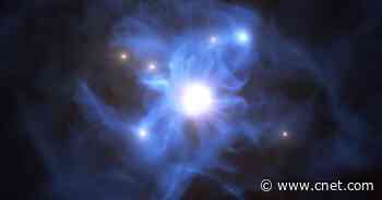 Monstrous black hole traps six ancient galaxies in a cosmic 'spider's web'     - CNET