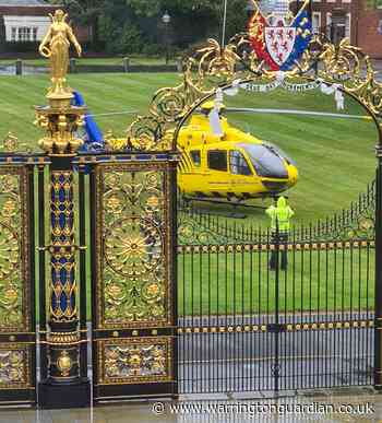 Air ambulance lands on Town Hall lawn after man falls from roof of building - Warrington Guardian