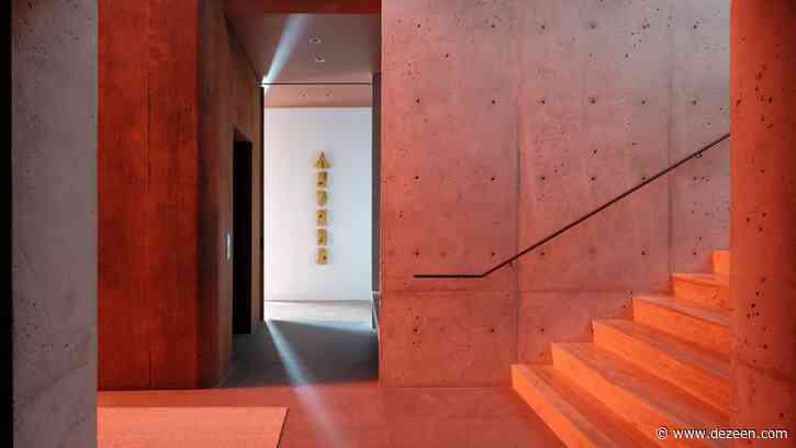 Tinted glass bathes Lookout House by Faulkner Architects in red glow