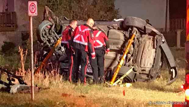 2 in critical condition after car crashes through fence, strikes trees along Centre St N