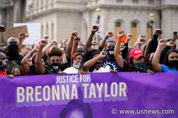 The Latest: Officers Didn't 'Rush In' After Taylor Shot