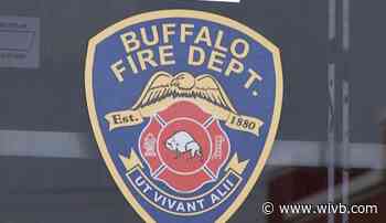 Dog, two men rescued from overnight house fire on Pratt St.