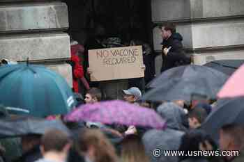 The Latest: Backlog Contributes to UK Setting Daily Record