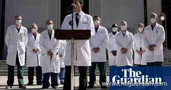 Trump medical team 'cautiously optimistic' after Covid hospital admission – video - The Guardian