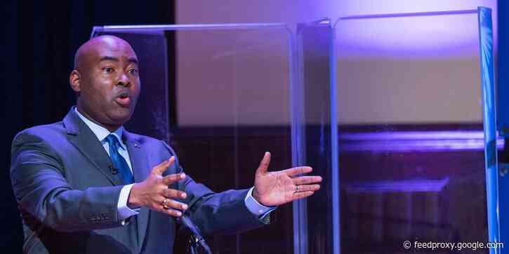 Lindsey Graham's Democratic challenger, Jaime Harrison, shielded himself with a plexiglass partition during their first debate