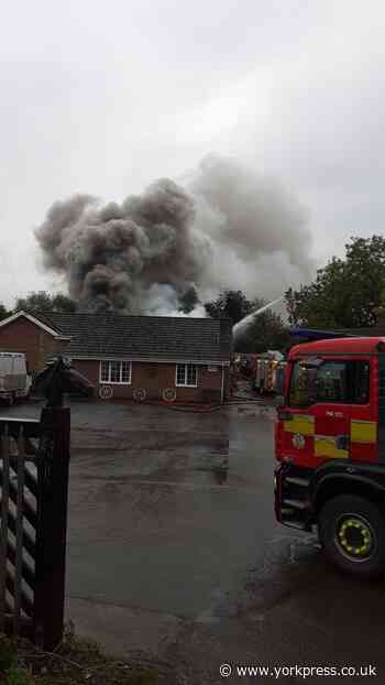 Crews attend large scrap yard fire