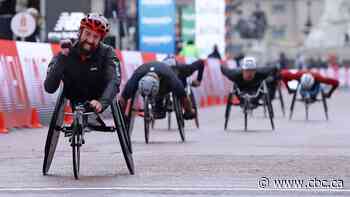 Canada's Brent Lakatos wins London Marathon men's wheelchair race
