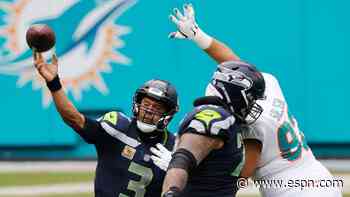 Wilson ties Manning's mark with 16th TD pass