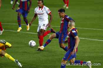Sevilla suffocates Barcelona in 1-1 draw at Camp Nou