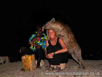 A Clitheroe photojournalist is flying to Zambia to lead wildlife tours