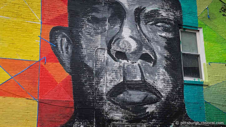 Local Artists Paint Mural Of John Lewis In Uptown