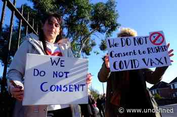 Campaigners protest outside hospital against 'rushed' coronavirus vaccine