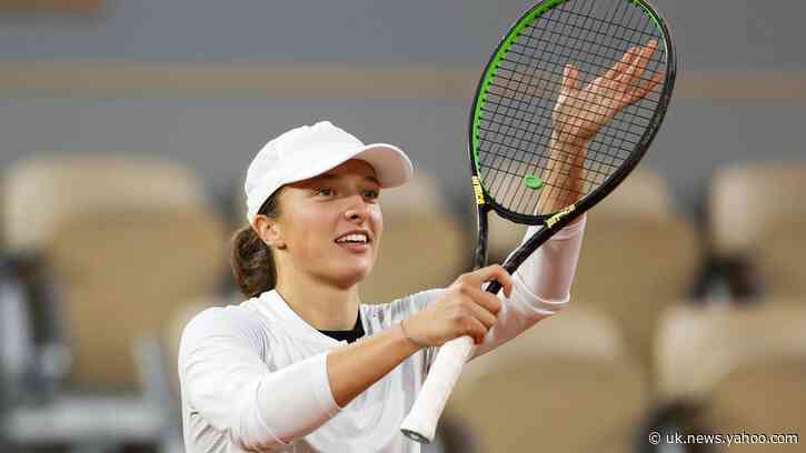 Swiatek routs Trevisan to reach first Grand Slam semi at French Open