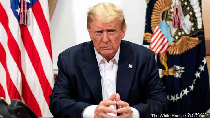 Recovering from virus, Trump goes to Oval Office