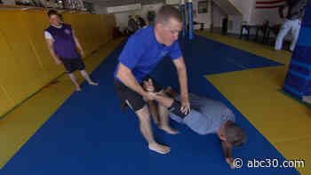 Brazilian fight champion teaches police the art of jiu-jitsu at Quintella MMA