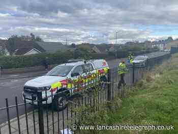 Firefighters, paramedics and police at scene of house fire
