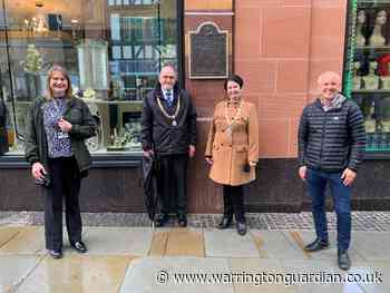 Historic plaque returns to its home in Bridge Street