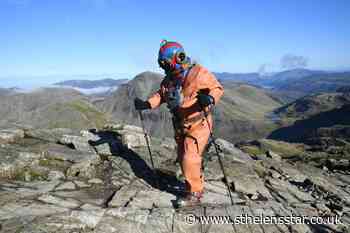 Fundraiser completes second peak wearing deep-sea diving suit - St Helens Star