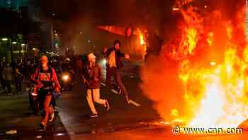 Hundreds arrested at protests over labor law in Jakarta