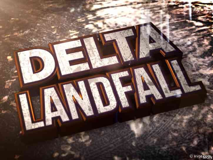 The Latest: Delta barely a hurricane, weakens moving inland