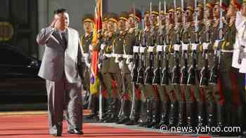 North Korea holds military parade with missiles