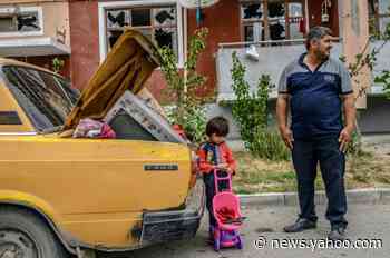 Under-fire Azerbaijanis greet ceasefire with calls for war