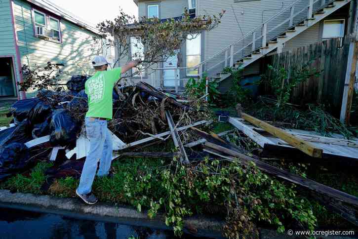 In hurricane-ravaged Louisiana, residents dig out, again