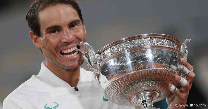 Perfect in Paris, Rafael Nadal overwhelms Djokovic to tie Federer