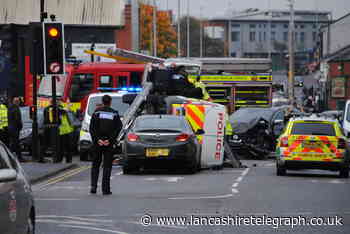 Road closed as police officer taken to hospital following incident in Blackburn