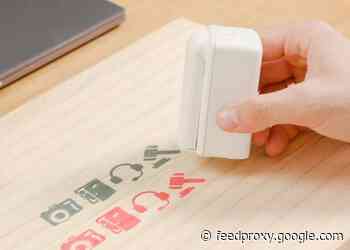 PrintPod handheld printer prints on any surface