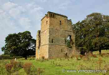 Bob Adams puts his boots back on and resumes his trek to the source of the River Derwent