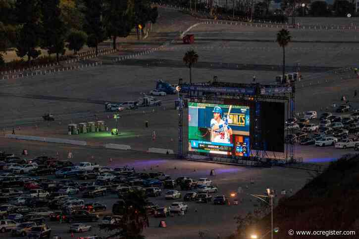 Photo: Fans roll to Dodger Stadium ‘drive-in’ for NL championship series