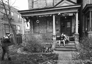 Come out and say cheese! Photographer connects with community with ‘porchtraits’